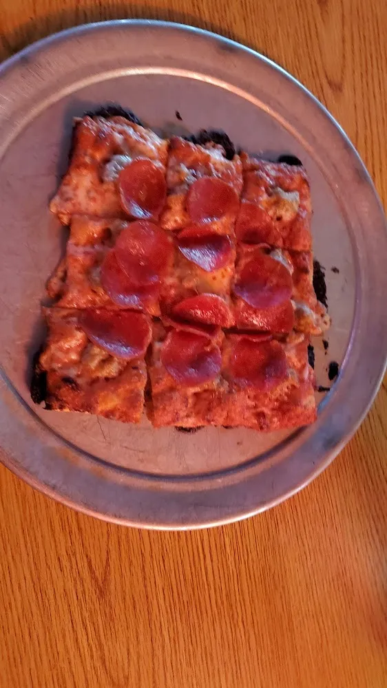 Slice of Pepperoni Pizza